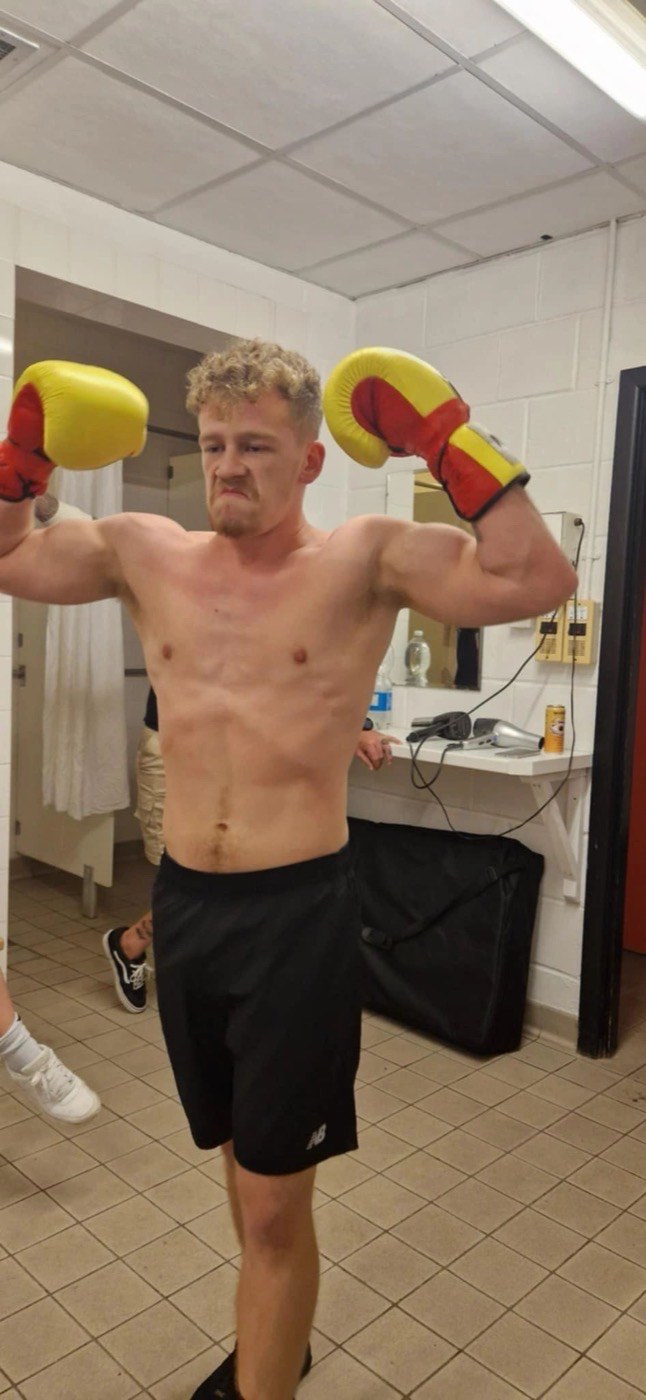 Fighters celebrating a win at a Valhalla Martial Arts fight night