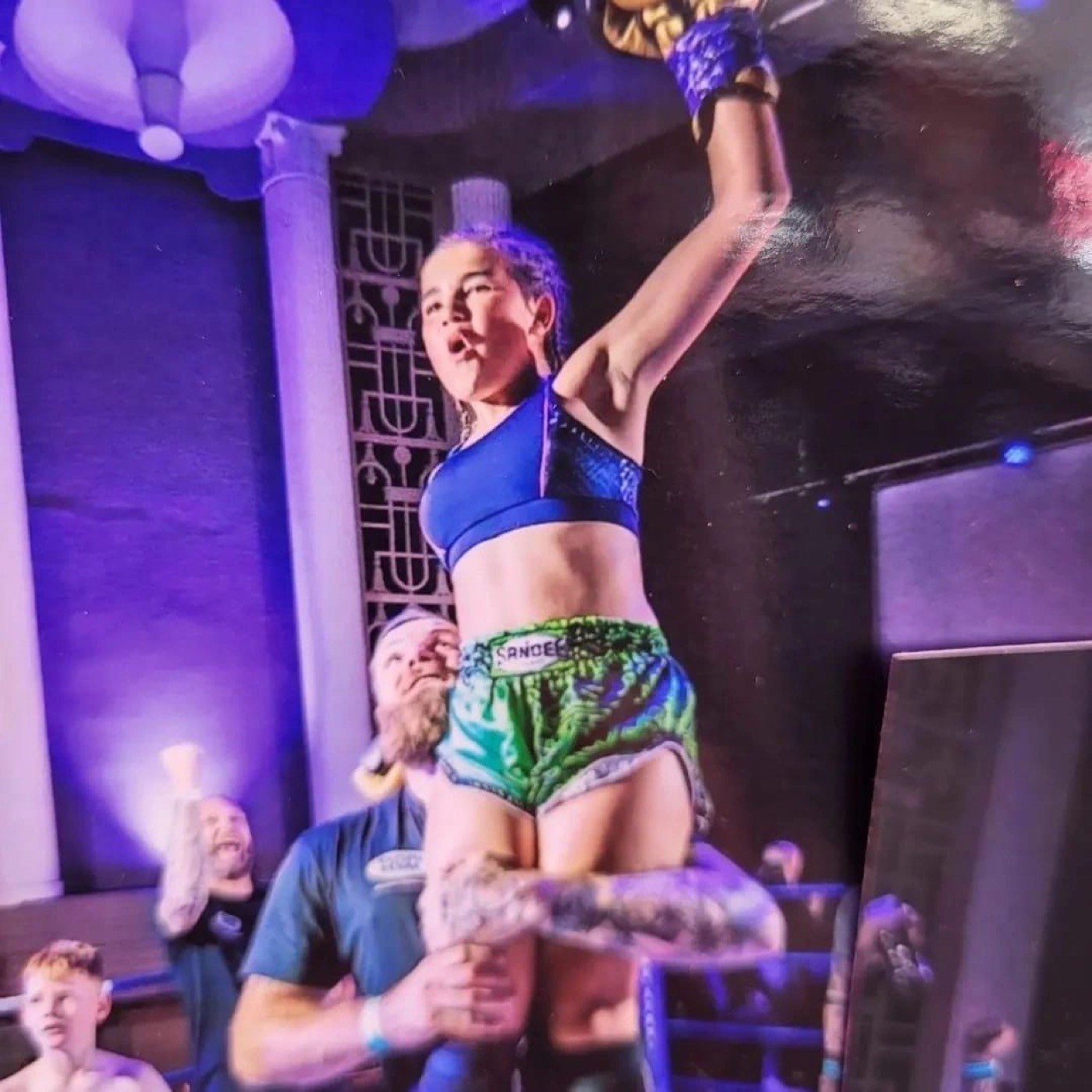 A Valhalla Martial Arts fighter celebrating a win in the ring