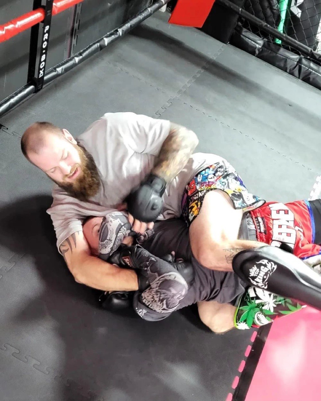 Pad work and striking drills at the Valhalla Weymouth fighting gym