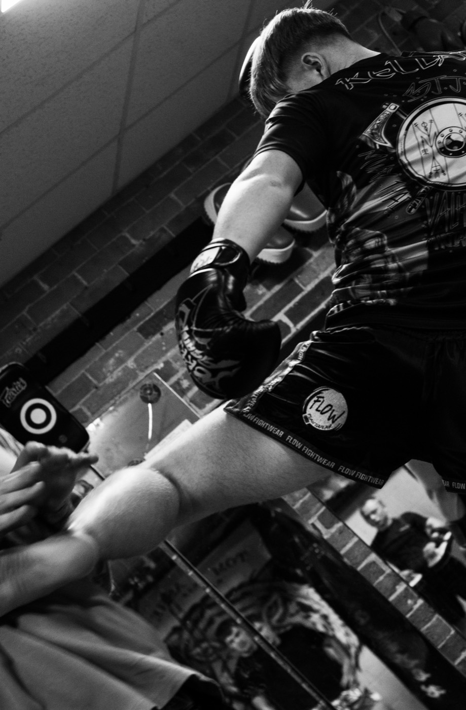 A Valhalla Martial Arts fighter warming up in branded kit